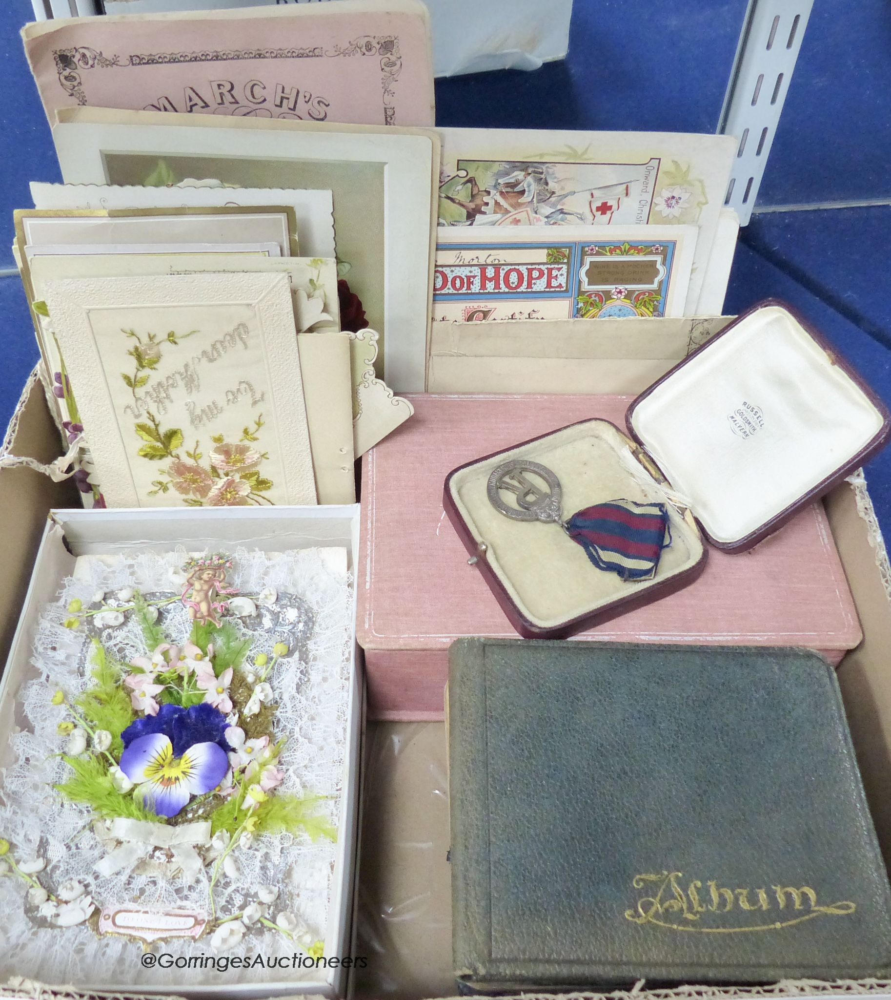 A collection of early 20th century greetings cards, Valentine's cards, autograph albums etc